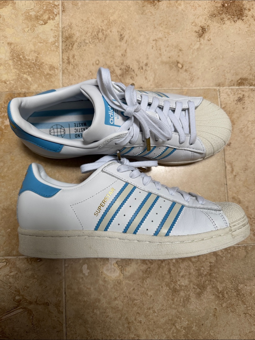 Adidas Super White Sneakers with Light Blue Stripes and Heel Tab. Men’s size 7.5